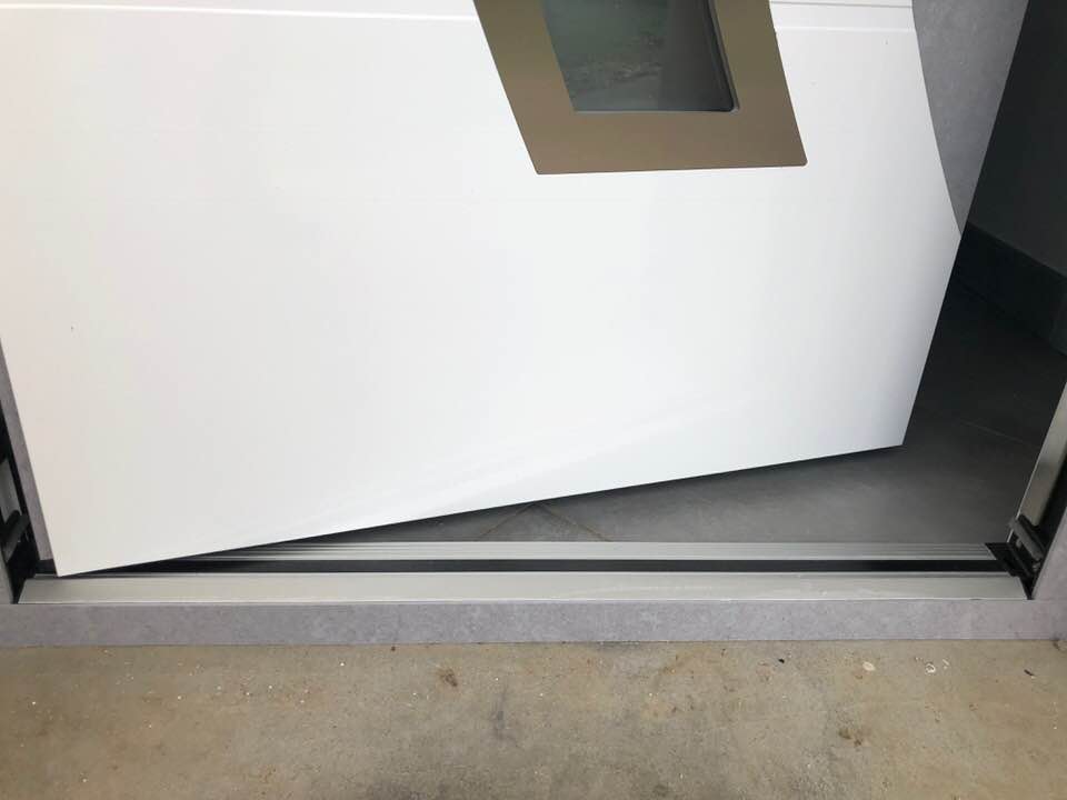 Porte d'entrée réalisation Trihome