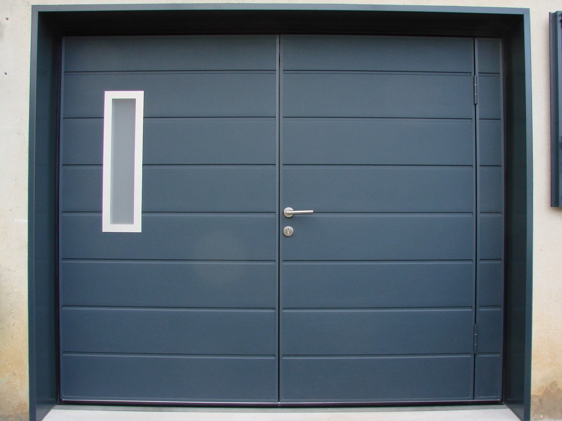 Porte de garage réalisation Trihome