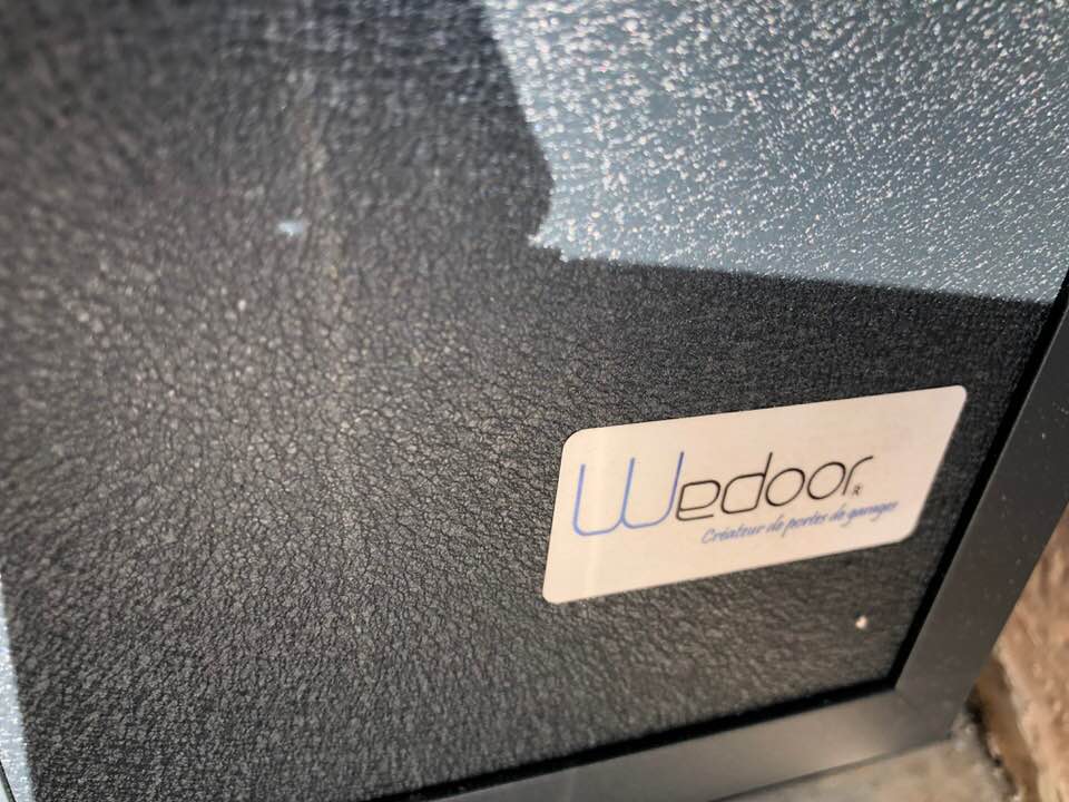 Porte de garage réalisation Trihome