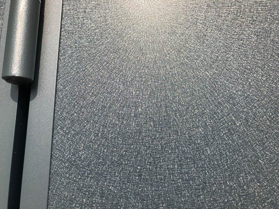 Porte de garage réalisation Trihome