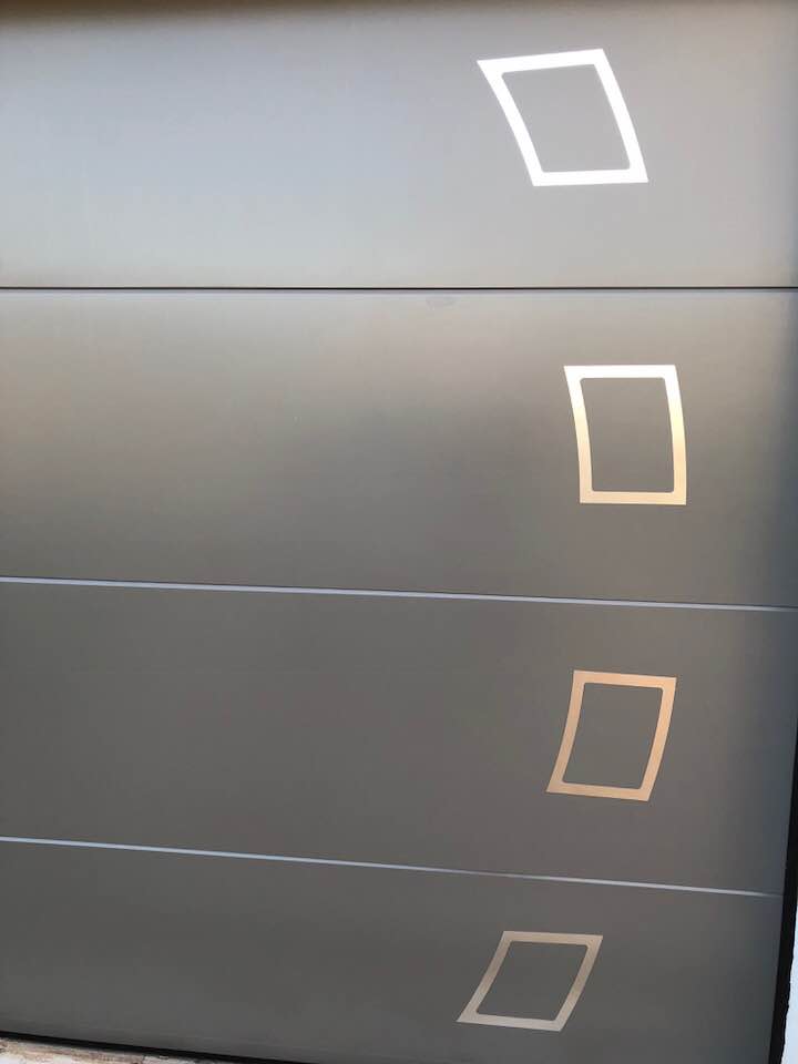 Porte de garage réalisation Trihome