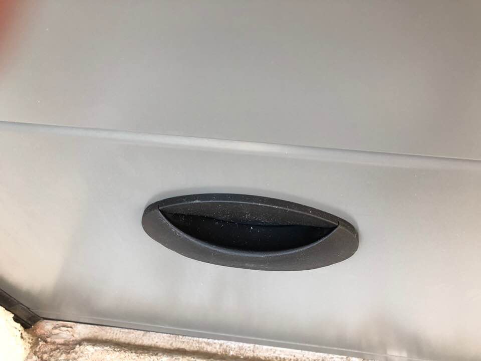 Porte de garage réalisation Trihome