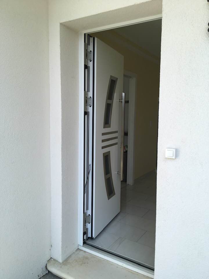 Porte d'entrée réalisation Trihôme