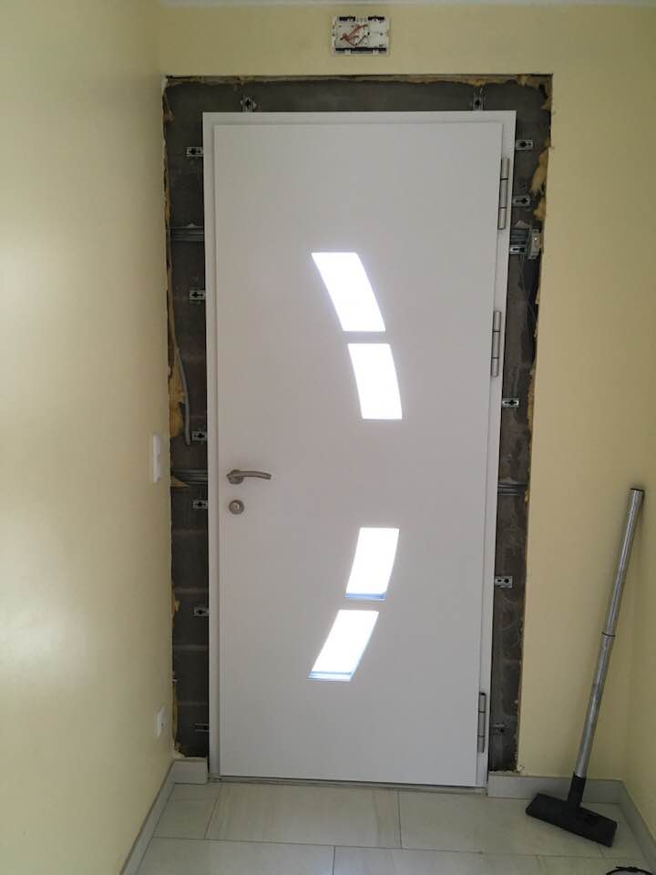 Porte d'entrée réalisation Trihôme