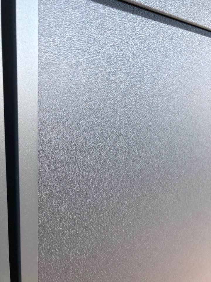 Porte de garage réalisation Trihome