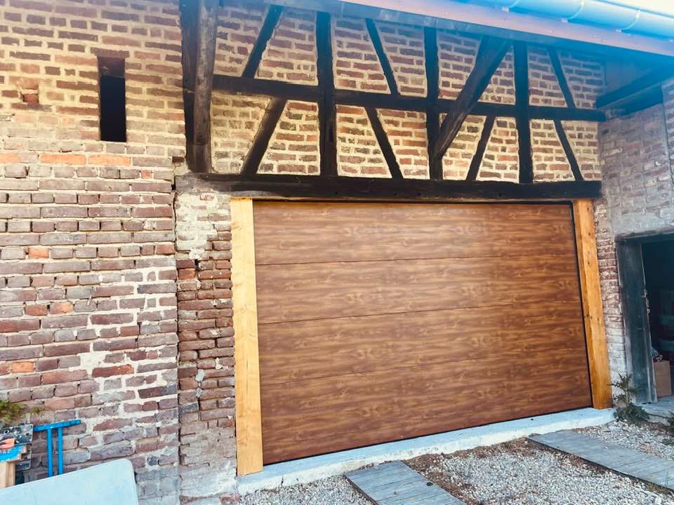 Porte de garage grande largeur by. Trihome Menuiseries