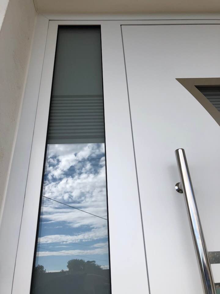 Porte d'entrée réalisation Trihome