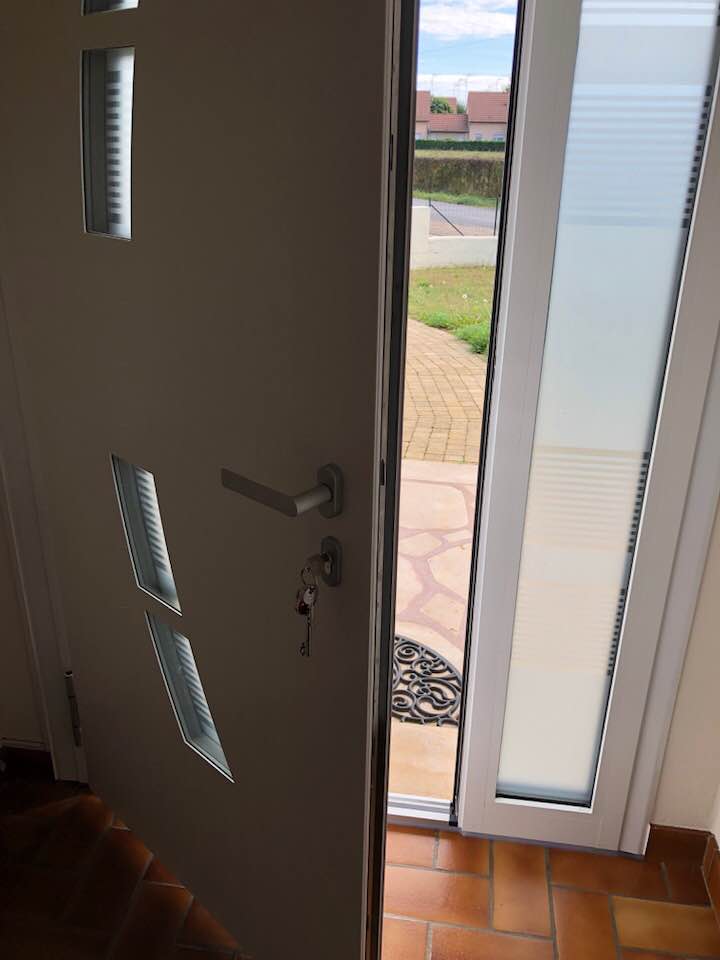 Porte d'entrée réalisation Trihome