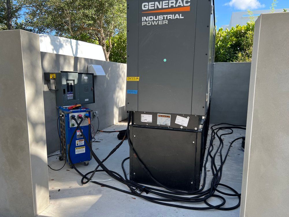 A generator with a lot of wires attached to it.