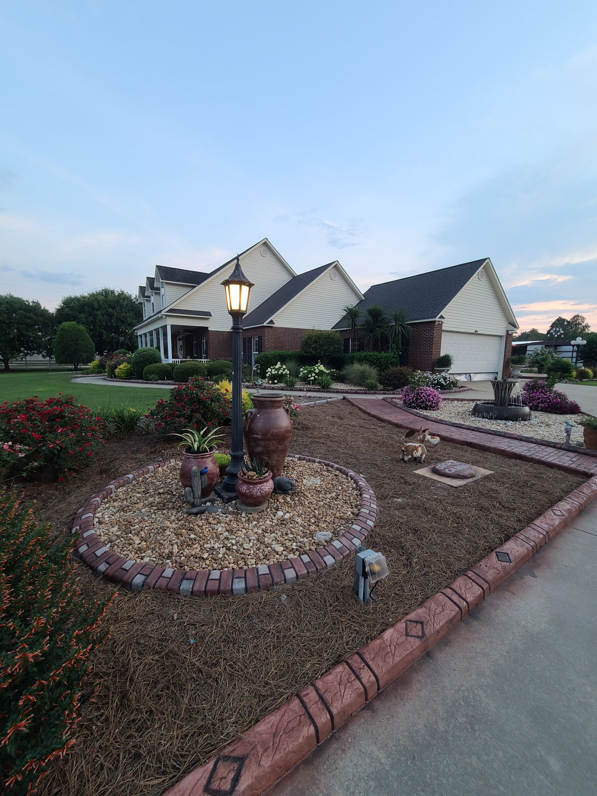 A house with a lamp post in front of it.