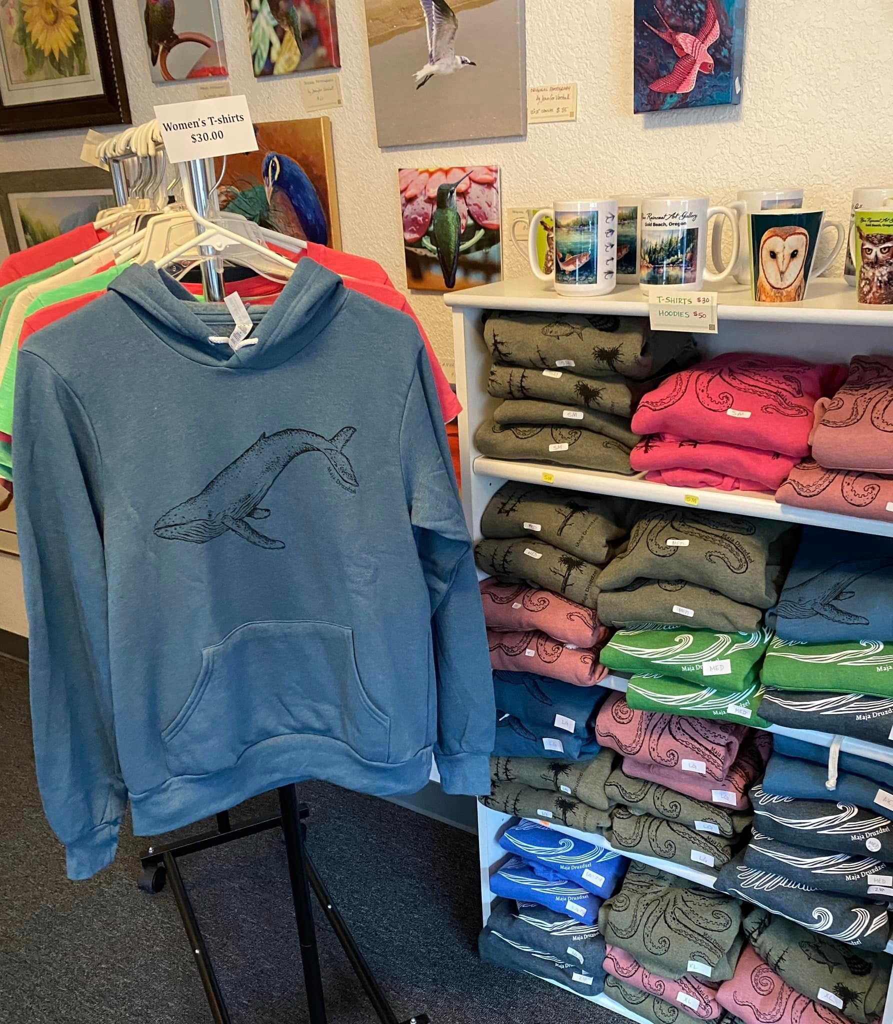 A Hoodie Is Hanging on A Rack in A Store