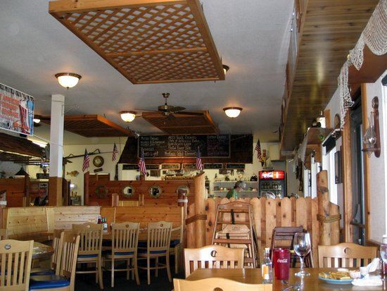 Interior of Restaurant with Wooden Tables and Chairs