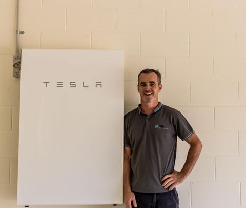 tesla charging — Electricians in Redlynch, QLD