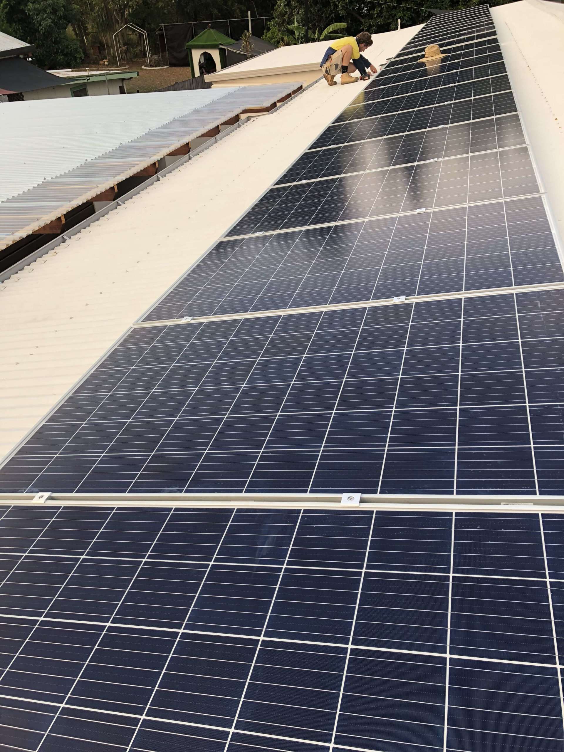 installing solar panels - Ample Electrical