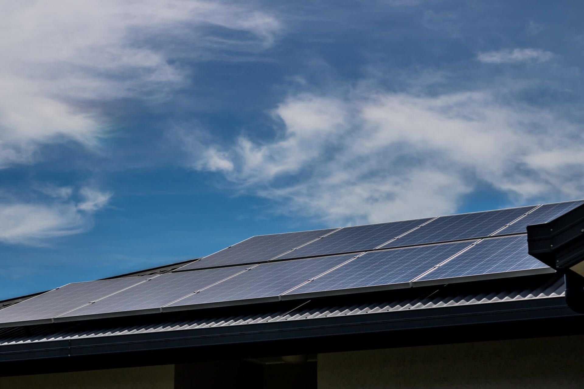 solar panels and sky - Ample Electrical