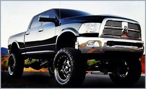 Black Dodge Ram Truck parked outside | Leonardi Automotive