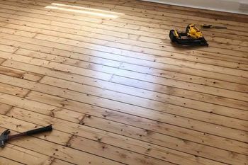wood floor being installed