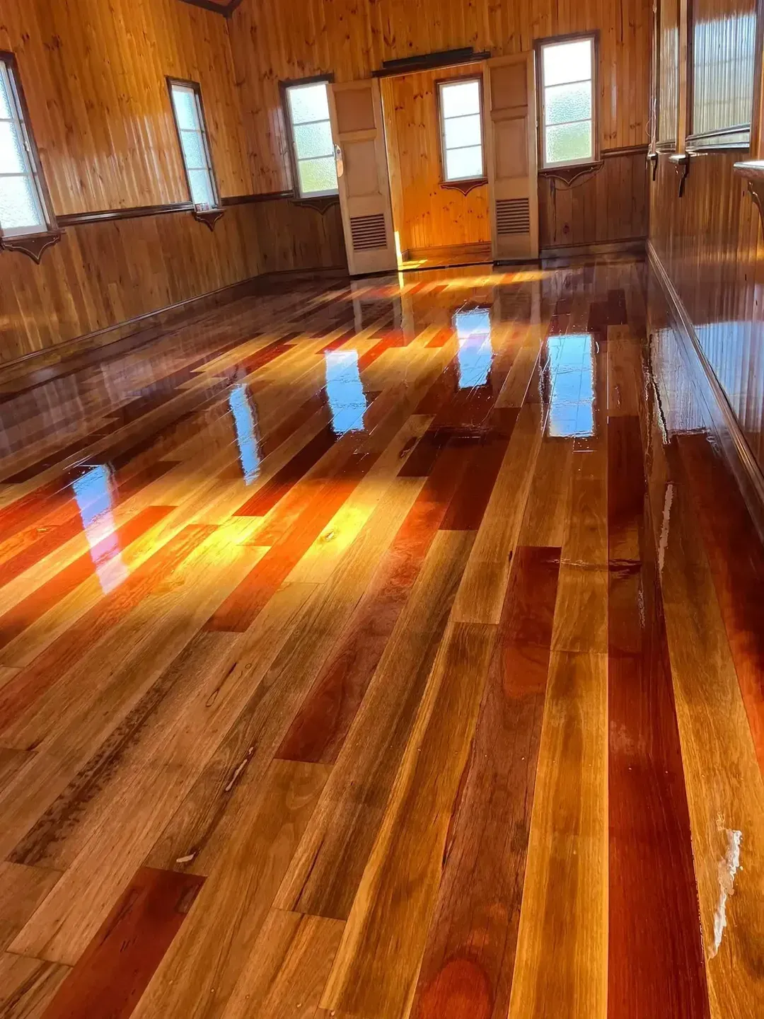 A Room With a Wooden Floor and Wooden Walls — Toowoomba Polished Floors in Warwick, QLD