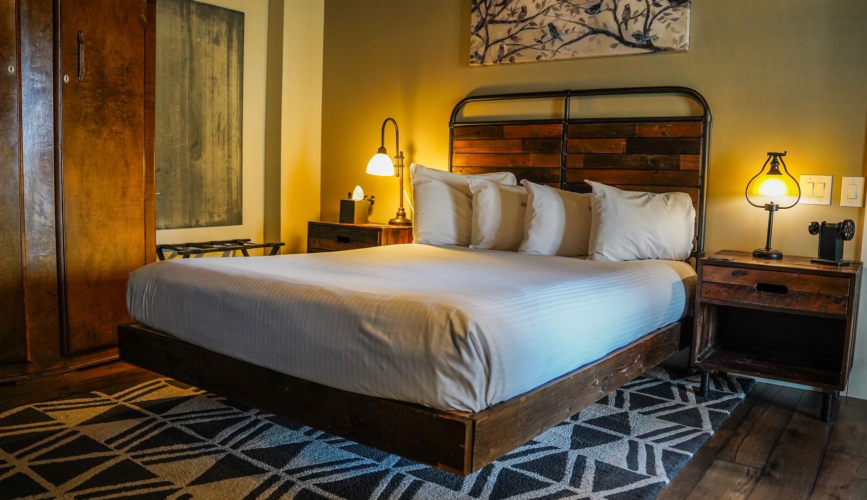 There is a large bed in the middle of the room.