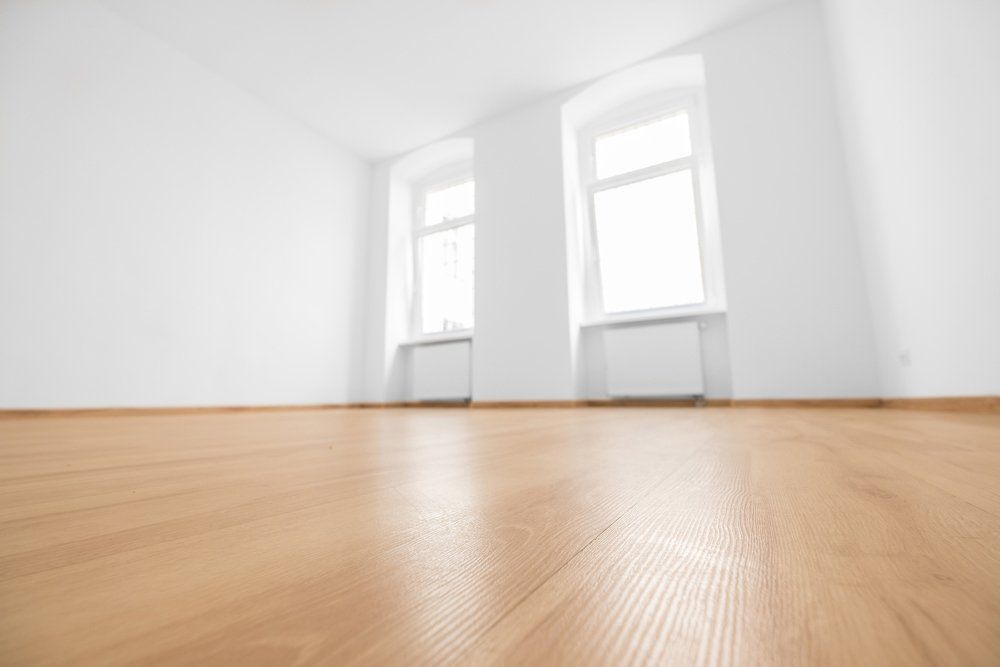 Empty Room With Timber Flooring — Floor Services in Kleinton, QLD