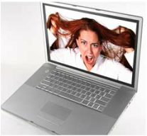 A laptop computer with a picture of a woman on the screen.