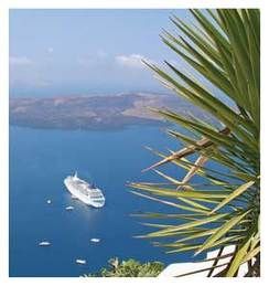 A cruise ship is floating on top of a large body of water.