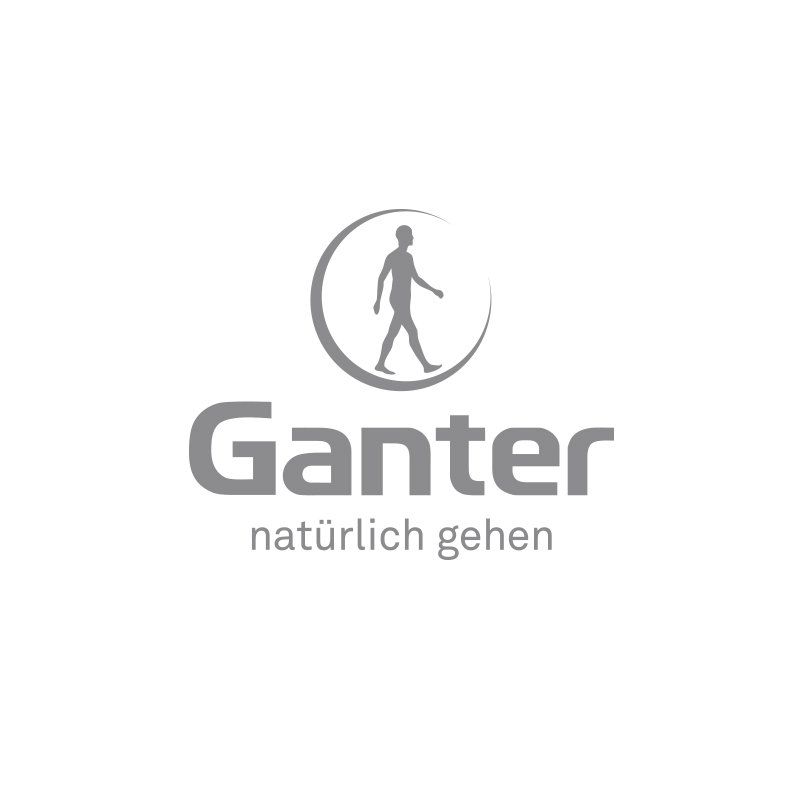 Ein Logo für Ganter Naturally Gehen mit einem Mann, der im Kreis geht.