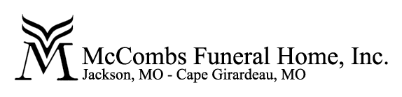 A black and white logo for mccombs funeral home inc.