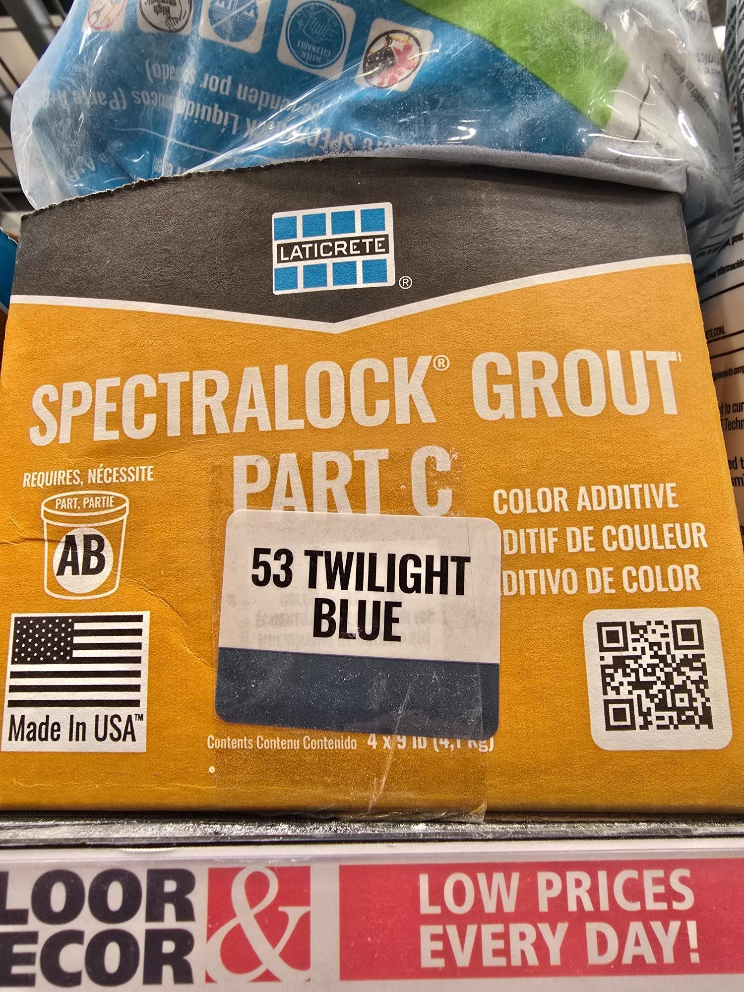 Bag of Spectralock Grout, part C, in Twilight Blue.  Made in USA, on display in a store.