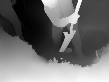 Person using a shovel; close-up shows the shovel cutting into dark ground.