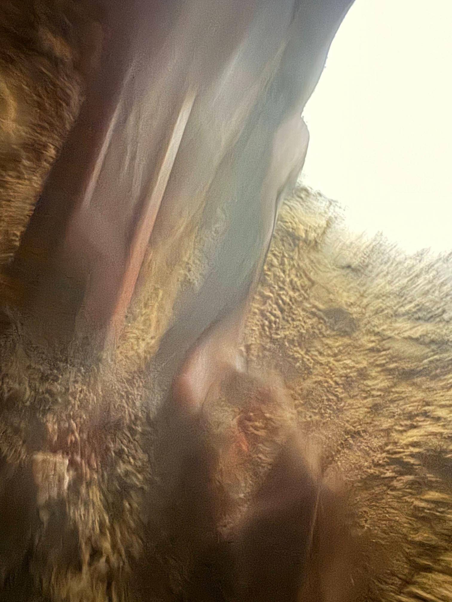 Fur, possibly animal, with dark shadows and lighter fur highlights.