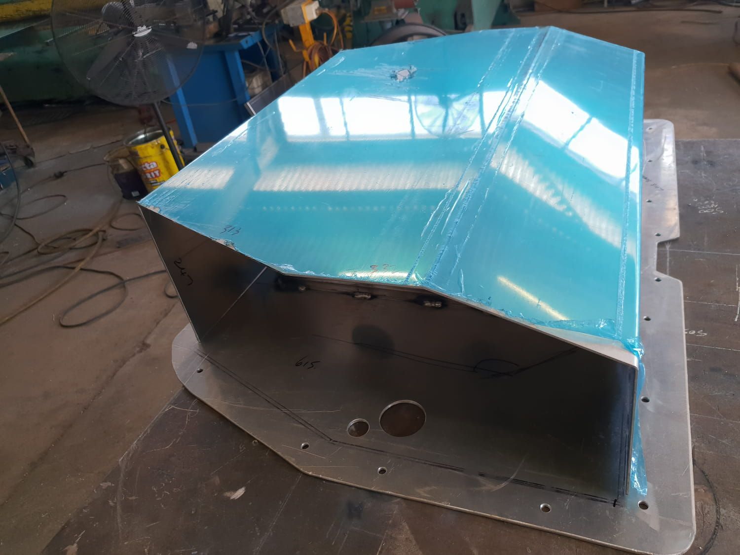 A Large Piece Of Metal Is Sitting On Top Of A Table — DJ Welding & Services in Currajong, QLD