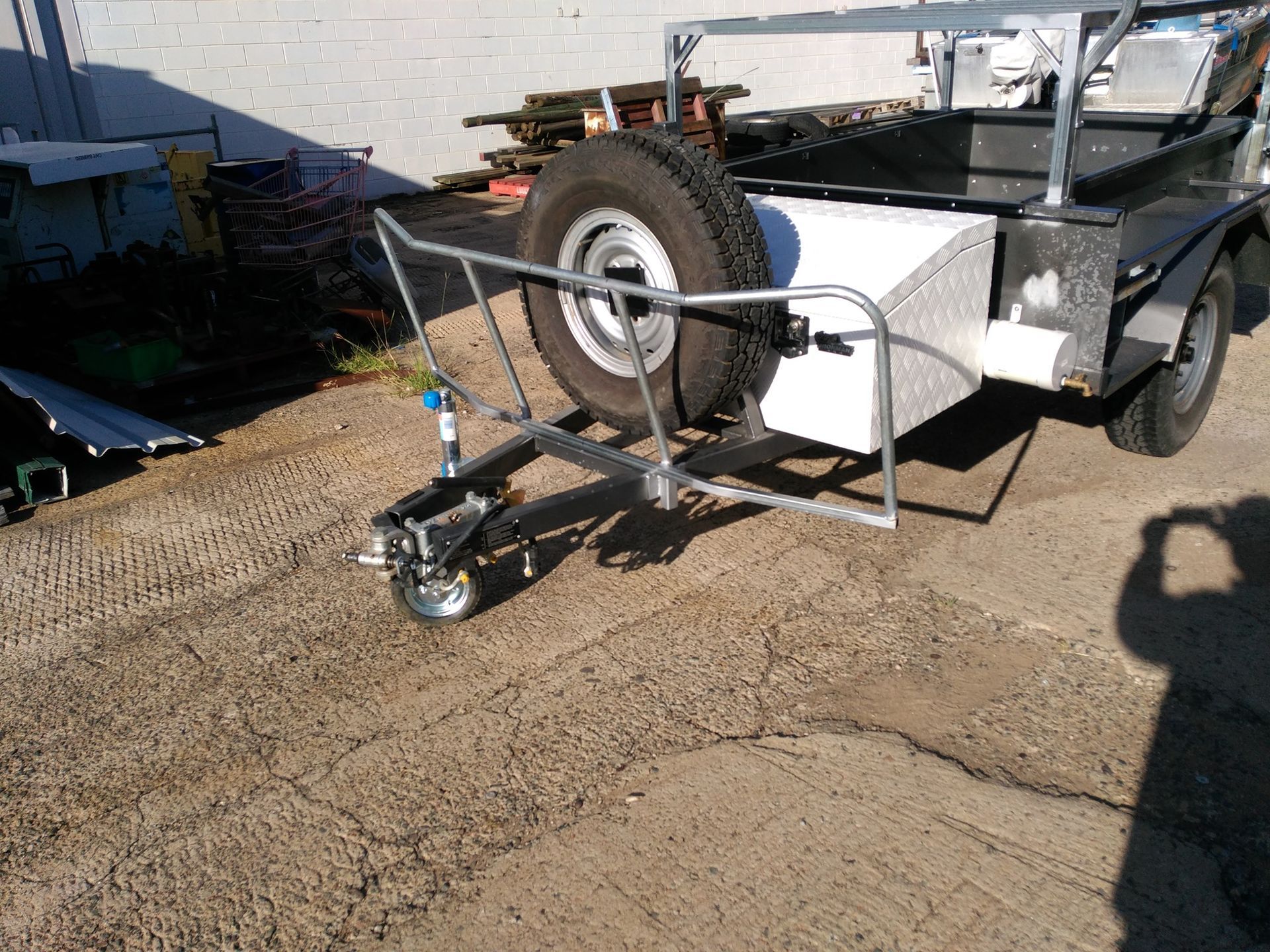 A Trailer With The Word Scott On It Is Parked Next To A Truck — DJ Welding & Services in Currajong, QLD