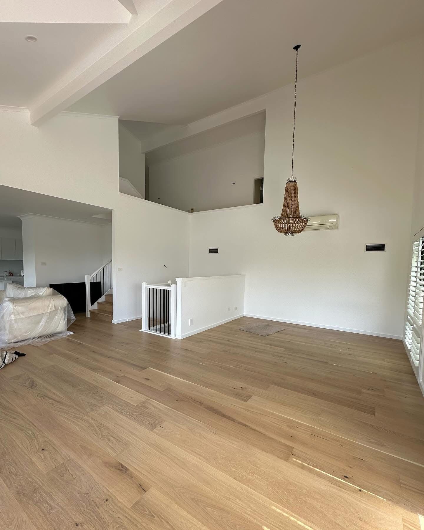 A Before And After Picture Of A Living Room — Blake Saunders Painting In Edgeworth, NSW