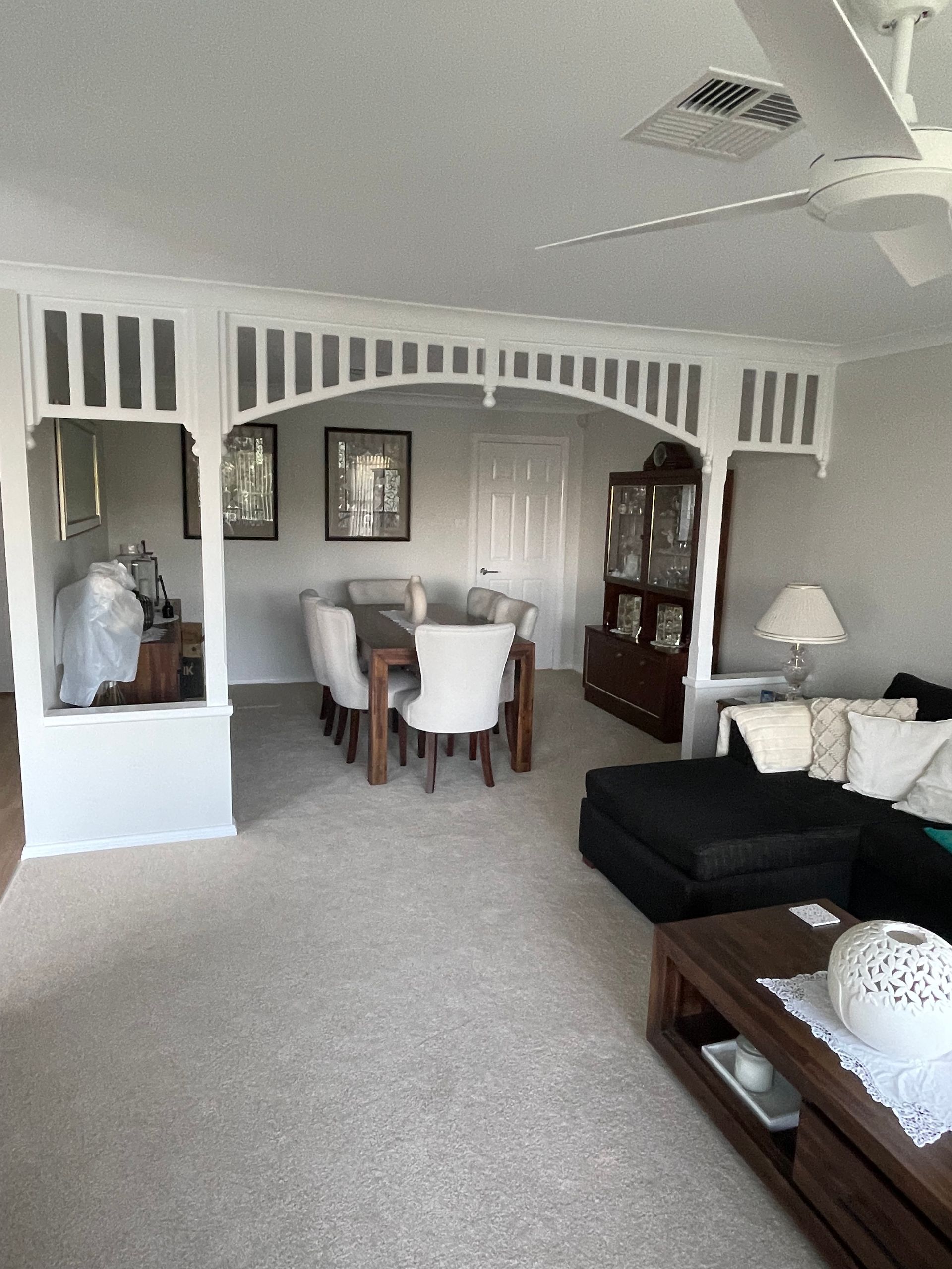 A living room with a dining room table and chairs — Blake Saunders Painting In Edgeworth, NSW