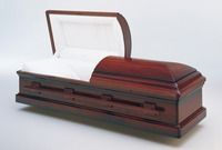 dark brown wooden casket