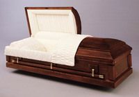 a wooden casket with the lid open 