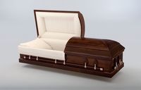 dark wood casket with the lid open on a white surface .