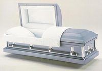 a silver casket with a flag inside of it .