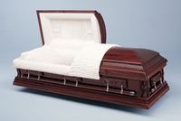 a wooden casket with the lid open 