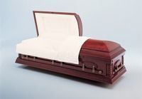  wooden casket with the lid open with ivory liner