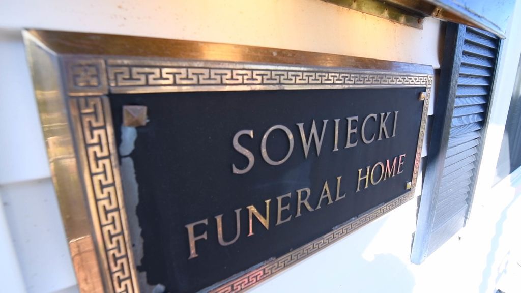 a sign that says sowiecki funeral home on it