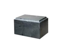 a black marble box is sitting on a white surface .
