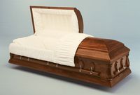 wood casket with the lid open 
