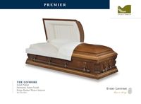 light brown wood casket with white liner