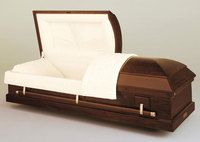 dark wood casket with the lid open 