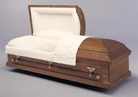  wooden casket with the lid open with ivory liner
