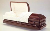 dark wood casket with the lid open