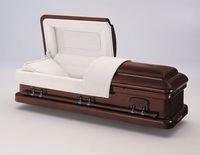 a brown casket with the lid open on a white surface .