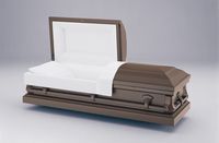 a brown coffin with the lid open on a white surface .